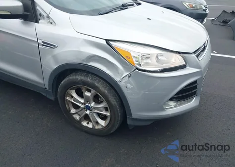 2014 Ford Escape Titanium z USA, uszkodzony, nr VIN 1FMCU9JX3EUD57511